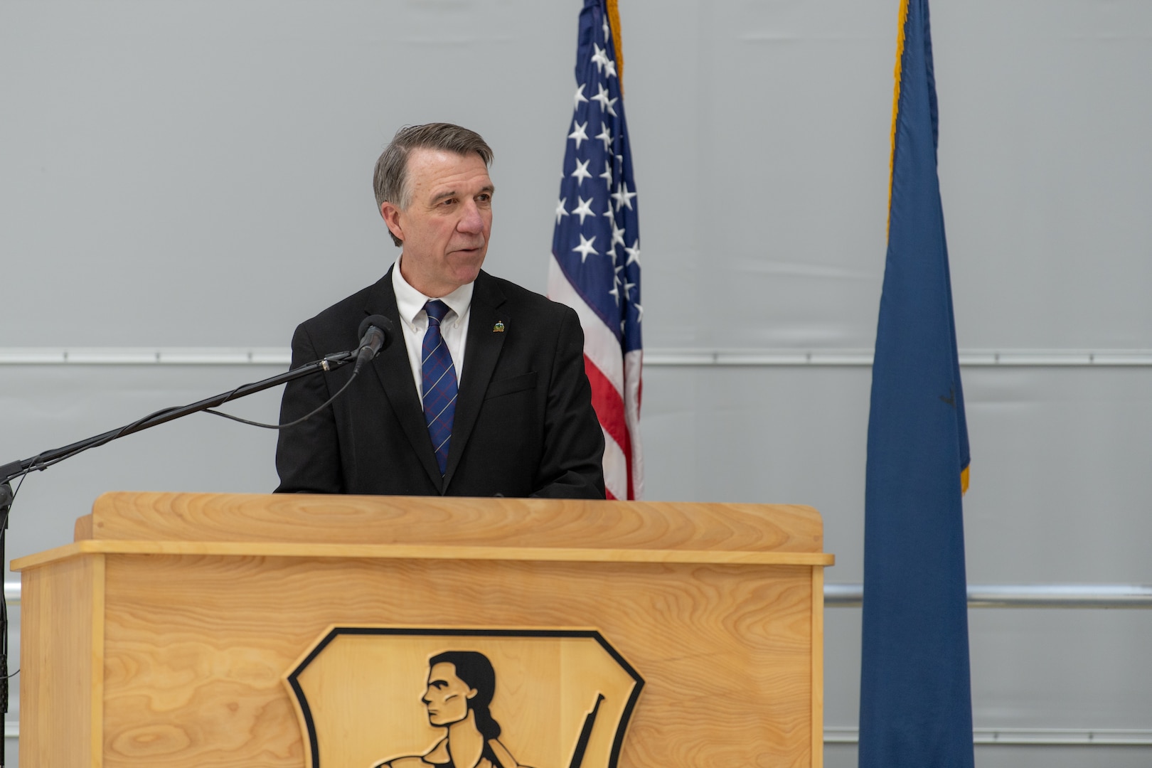 Vermont Governor Phil Scott addresses members of the 158th Fighter Wing and their families during a deployment ceremony at the Vermont Air National Guard Base, South Burlington, Vermont, Thursday, April 28th, 2022. The ceremony recognizes the sacrifices of Airmen and their families ahead of the 158th fighter wing’s deployment to Europe. (U.S. Air Force photo by Tech. Sgt. Richard Mekkri)
