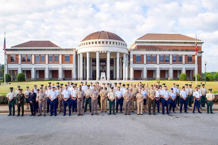 Senior enlisted advisors from the U.S., Colombian, Brazilian and Mexican militaries stand in front of the National Infantry museums during the . PISAJ is a semi-annual military to military engagement with the Colombian military and their sergeants major academy focused on building upon senior leader competencies and instilling the necessity of joint operations in a complex world. (U.S. Army photo by Jose M. Saez)
