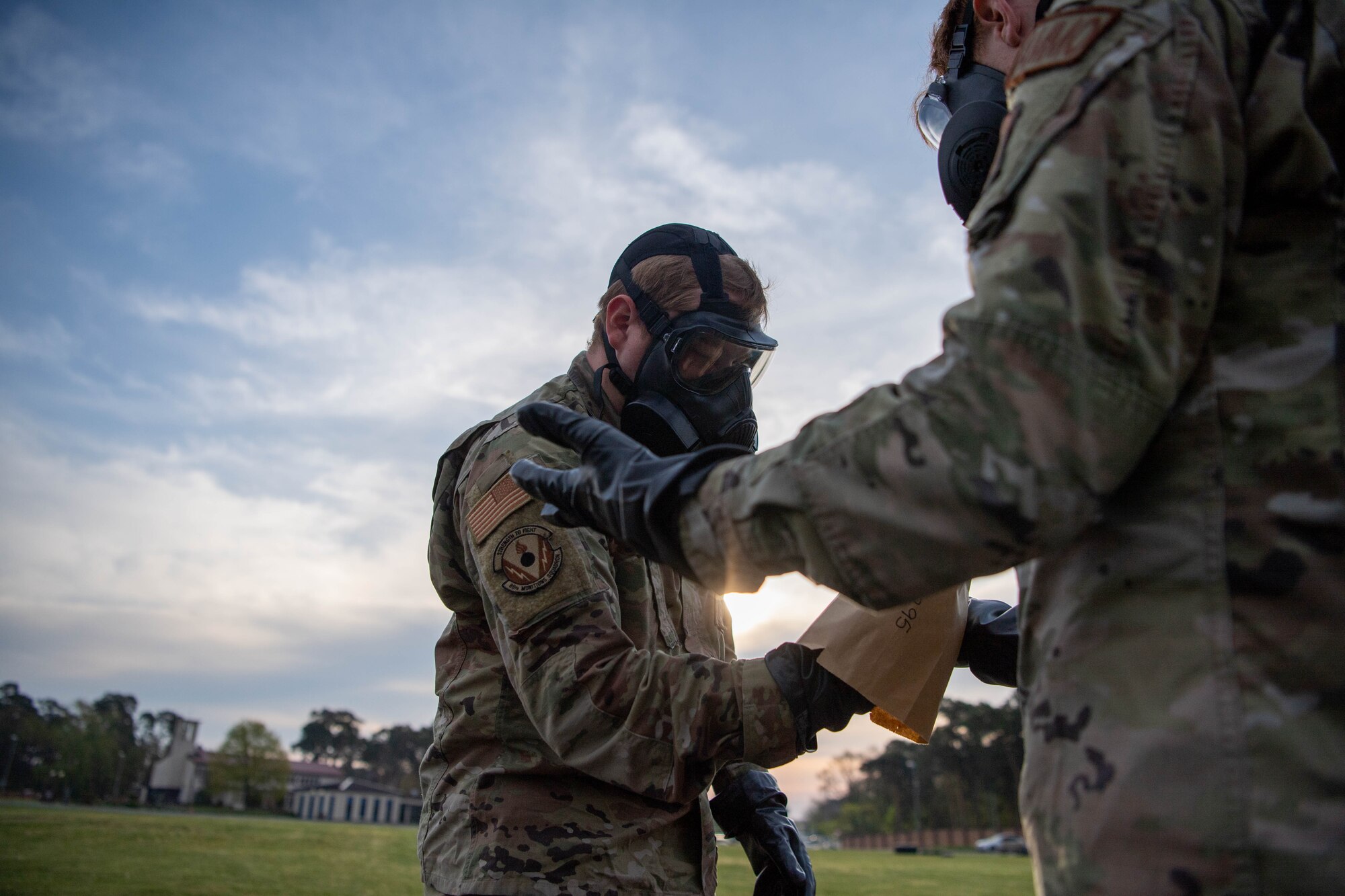 Airman check each other