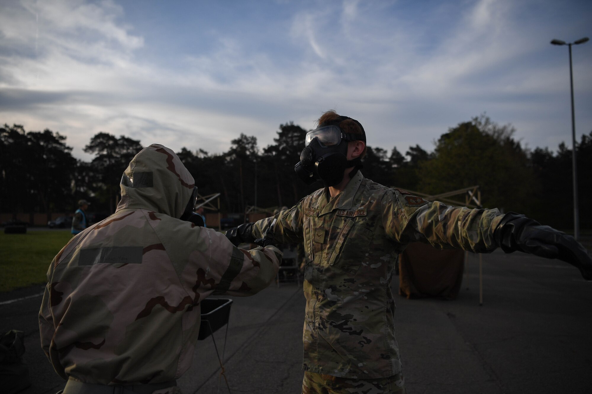 Airman checks another airman