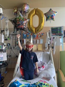 Hailey Heiden celebrates her new birthday at the University of Minnesota Medical Center in Minneapolis, Minnesota, July 20, 2020. It’s a tradition for bone marrow transplant recipients to receive a new birthday commemorating the day of their procedure. (Courtesy photo)