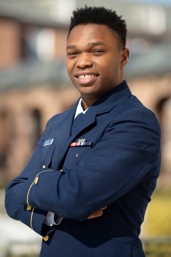 U.S. Coast Guard Academy cadet 1/c Tarran Johnson poses for an environmental portrait, here, March 16. Johnson was being celebrated for his outstanding academic and military performance during his four year cadet experience. (U.S. Coast Guard photo by Petty Officer 3rd Class Matthew Abban)