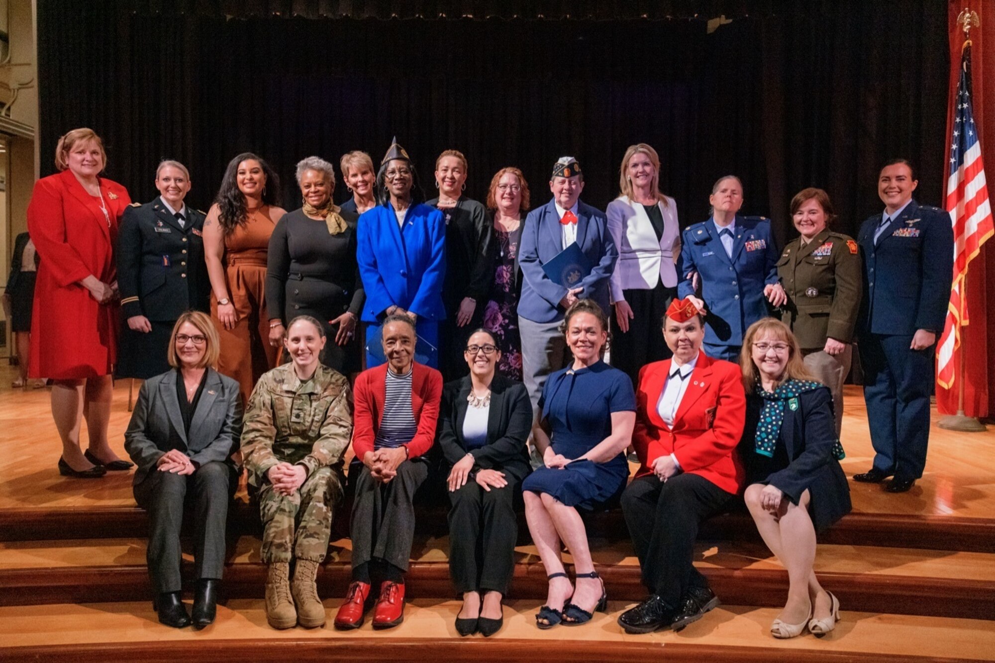 Women pose for a photo.