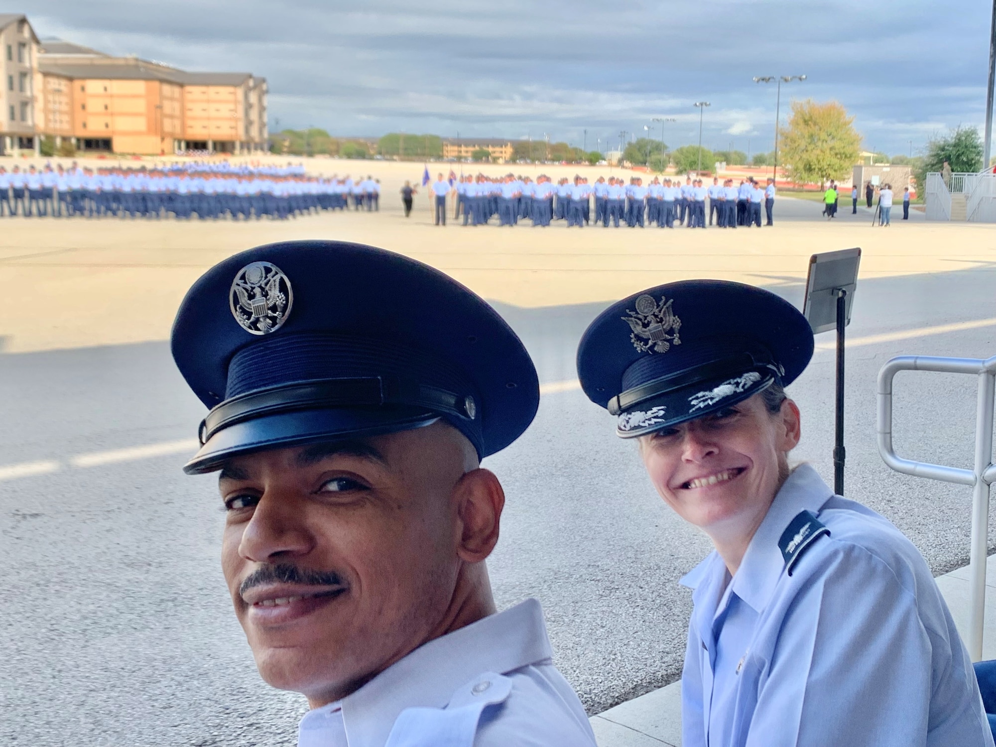 CMSgt Gravely and Col Storm in the stands at BMT graduation