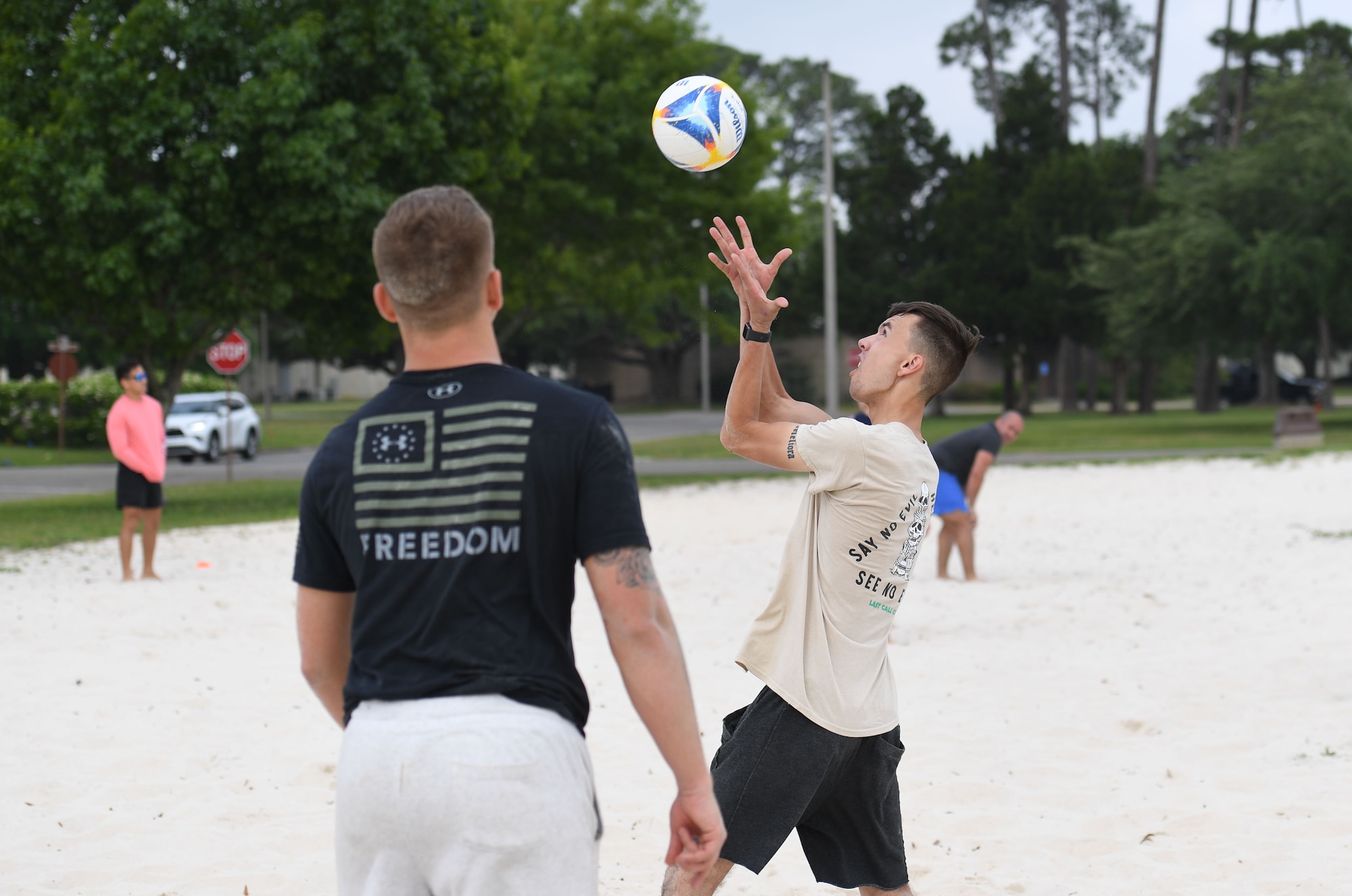U.S. Marine Private First Class Caleb Simmons, Keesler Marine Detachment student, hits a volleyball during the Sexual Assault and Awareness Prevention Month volleyball tournament at Keesler Air Force Base, Mississippi, April 29, 2022. More than 20 teams competed in the event, which was held in acknowledgment of Sexual Assault and Awareness Prevention Month throughout April. (U.S. Air Force photo by Kemberly Groue)
