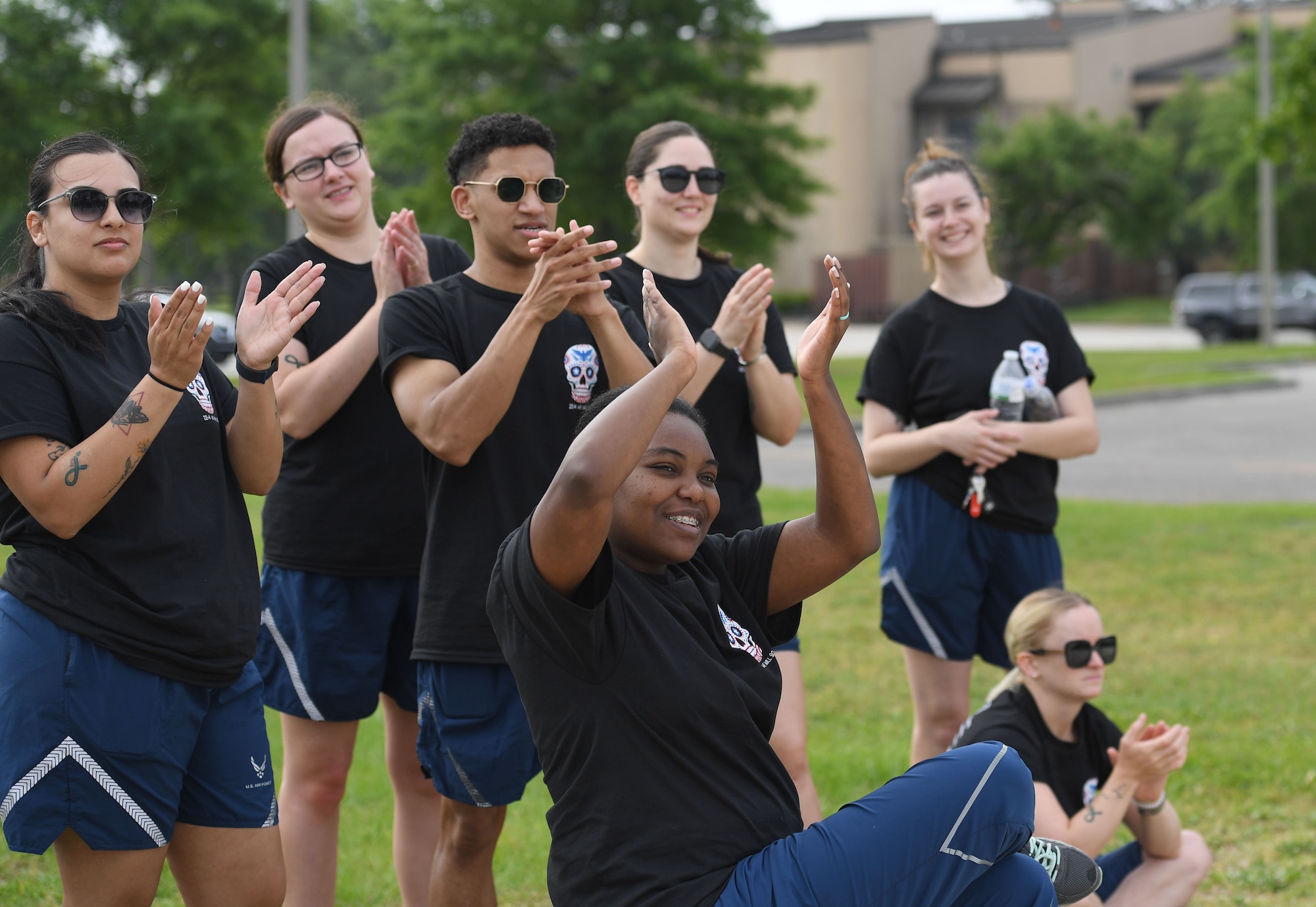 Airman Leadership School students cheer on their teammates during the Sexual Assault and Awareness Prevention Month volleyball tournament at Keesler Air Force Base, Mississippi, April 29, 2022. More than 20 teams competed in the event, which was held in acknowledgment of Sexual Assault and Awareness Prevention Month throughout April. (U.S. Air Force photo by Kemberly Groue)