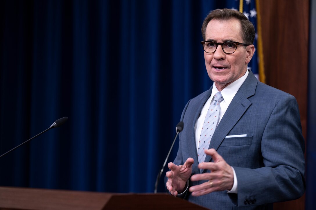 A man speaks to an audience.