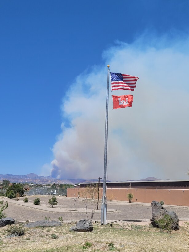 Smoke from the Cerro Pelado Fire, northwest of Cochiti Lake, N.M., is seen behind the lake's Visitor Center, April 29, 2022.