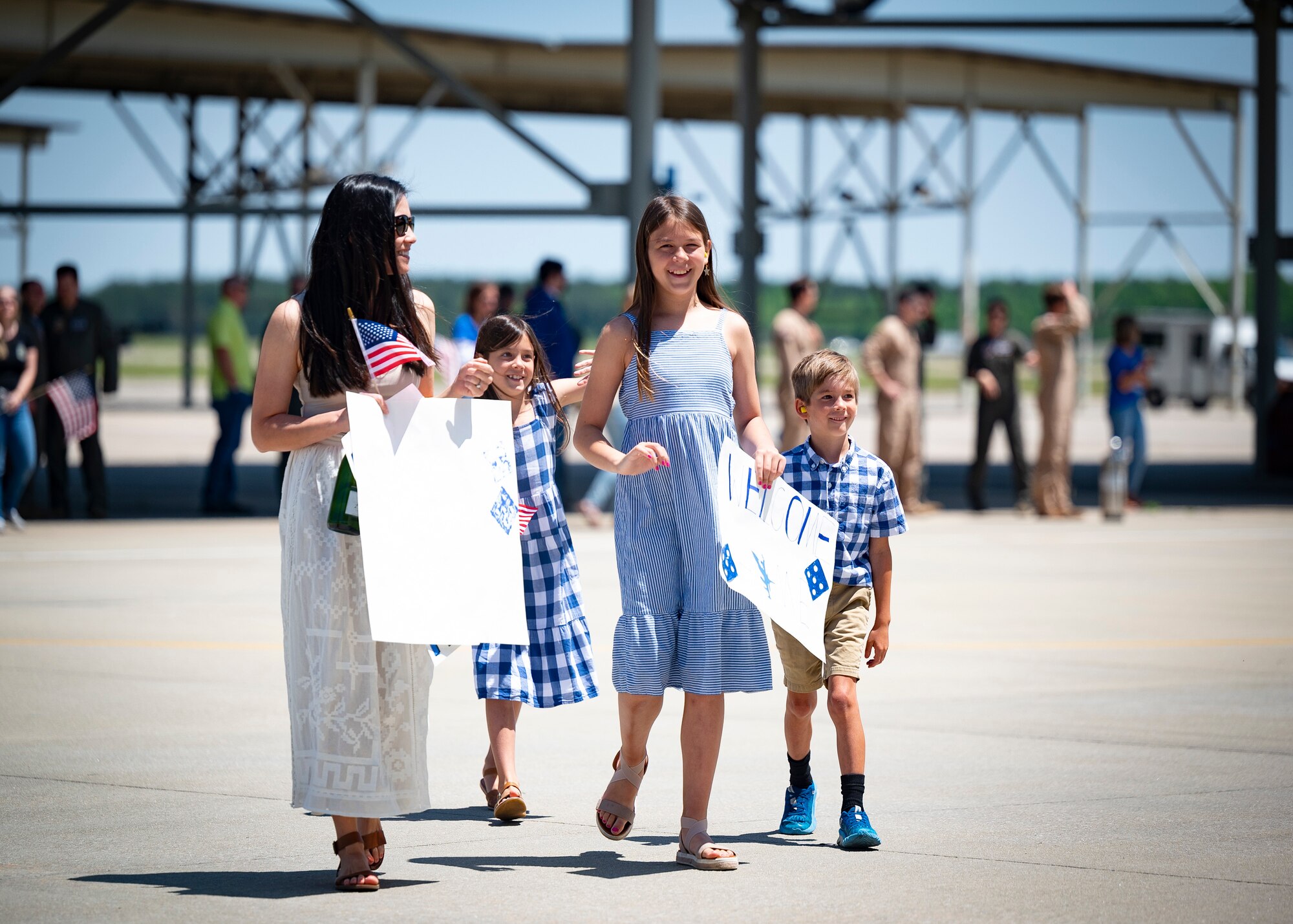 Image of friends and family reuniting after a redeployment