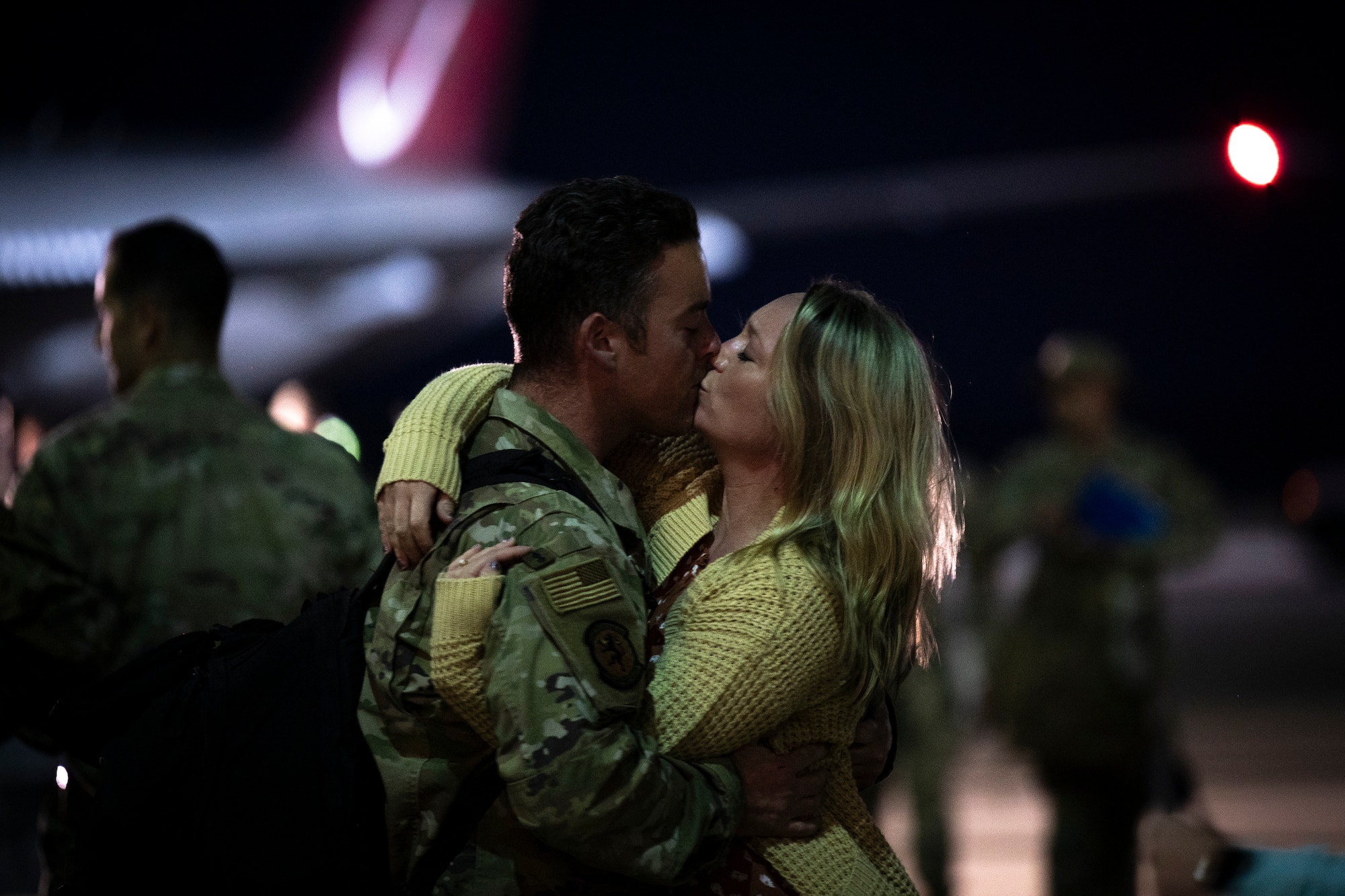 Image of friends and family reuniting after a redeployment