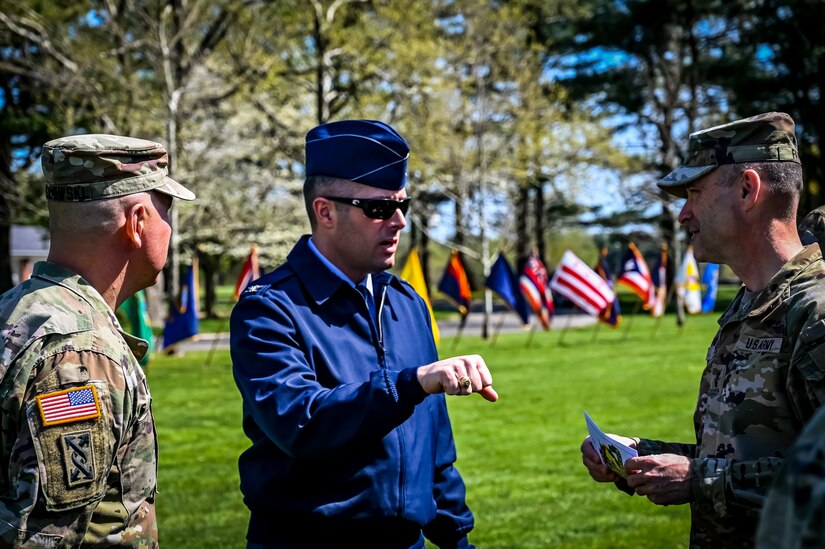 U.S. Air Force Col. Wes Adams, 87th Air Base Wing, commander, speaks to U.S. Army Maj. Gen. Rodney Faulk, 99th Readiness Division, commander, after a change of responsibility on April 29, 2022, at Joint Base McGuire-Dix-Lakehurst, N.J. The ceremonial event was held to symbolize the transition of authority from Command Sgt. Maj. Tamara Edwards to Command Sgt. Maj. James Van Zlike. A change of responsibility ceremony is a traditional event meant to reinforce noncommissioned officer authority in the U.S. Army and highlights their support to the chain of command.