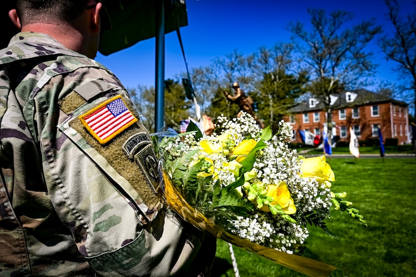 A bouquet of flowers is displayed during a change of responsibility on April 29, 2022, at Joint Base McGuire-Dix-Lakehurst, N.J. The ceremonial event was held to symbolize the transition of authority from Command Sgt. Maj. Tamara Edwards to Command Sgt. Maj. James Van Zlike. A change of responsibility ceremony is a traditional event meant to reinforce noncommissioned officer authority in the U.S. Army and highlights their support to the chain of command.