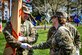 U.S. Army Command Sgt. Maj. Tamara Edwards, Army Support Activity Fort Fix, command sergeant major, coins a member of the honor guard after a change of responsibility on April 29, 2022, at Joint Base McGuire-Dix-Lakehurst, N.J. The ceremonial event was held to symbolize the transition of authority from Command Sgt. Maj. Tamara Edwards to Command Sgt. Maj. James Van Zlike. A change of responsibility ceremony is a traditional event meant to reinforce noncommissioned officer authority in the U.S. Army and highlights their support to the chain of command.