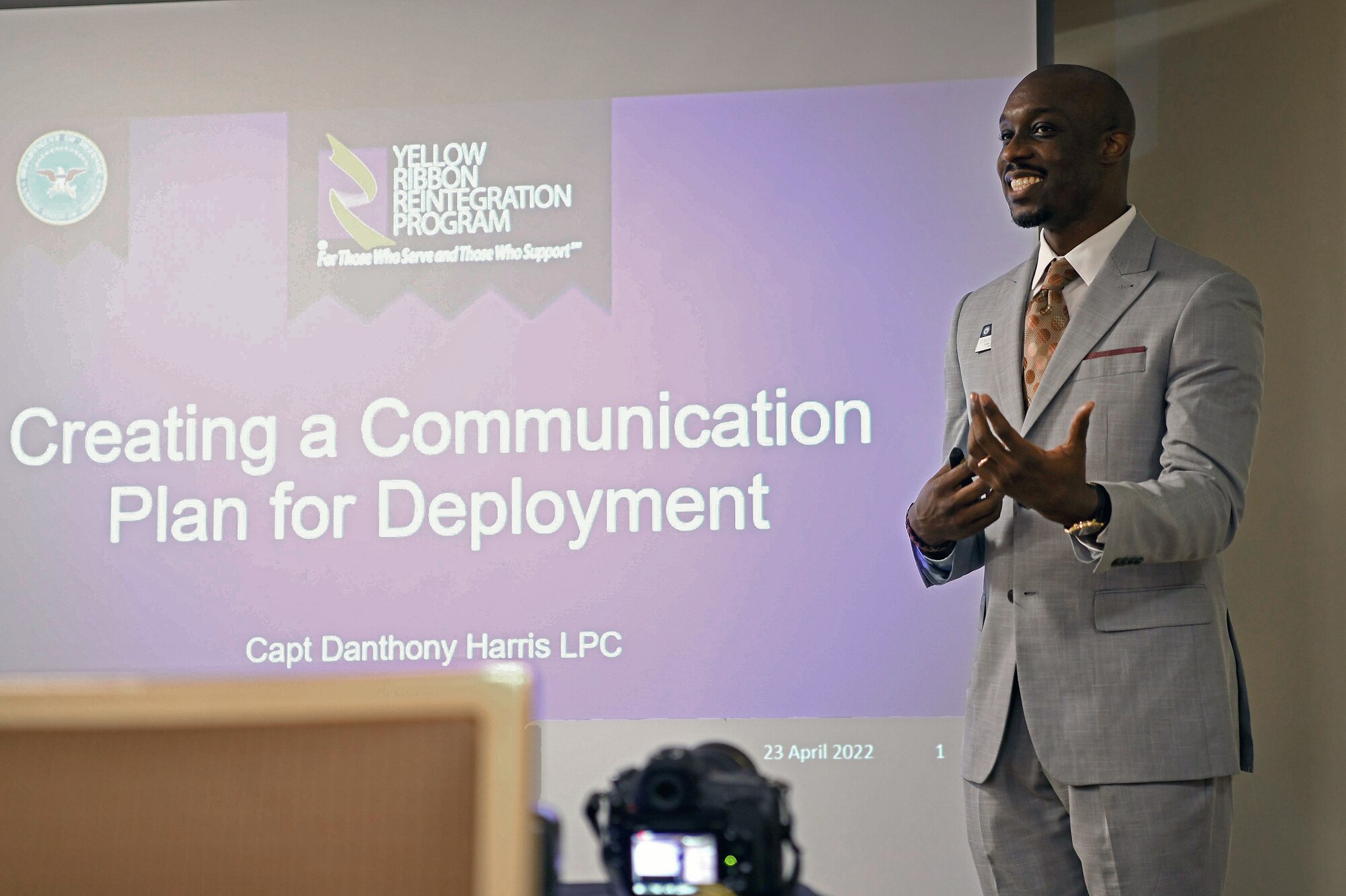Photo of D'Anthony Harris delivering a presentation.