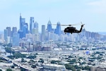 A UH-60 Black Hawk helicopter from the Pennsylvania National Guard’s 28th Expeditionary Combat Aviation Brigade flies over Philadelphia during a Dense Urban Terrain exercise. The exercise, which ran from July 25 to 29, was conducted by Task Force 46, a 600-personnel chemical, biological, radiological or nuclear response element comprising National Guard units from states across the country.