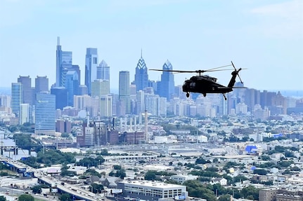 A UH-60 Black Hawk helicopter from the Pennsylvania National Guard’s 28th Expeditionary Combat Aviation Brigade flies over Philadelphia during a Dense Urban Terrain exercise. The exercise, which ran from July 25 to 29, was conducted by Task Force 46, a 600-personnel chemical, biological, radiological or nuclear response element comprising National Guard units from states across the country.