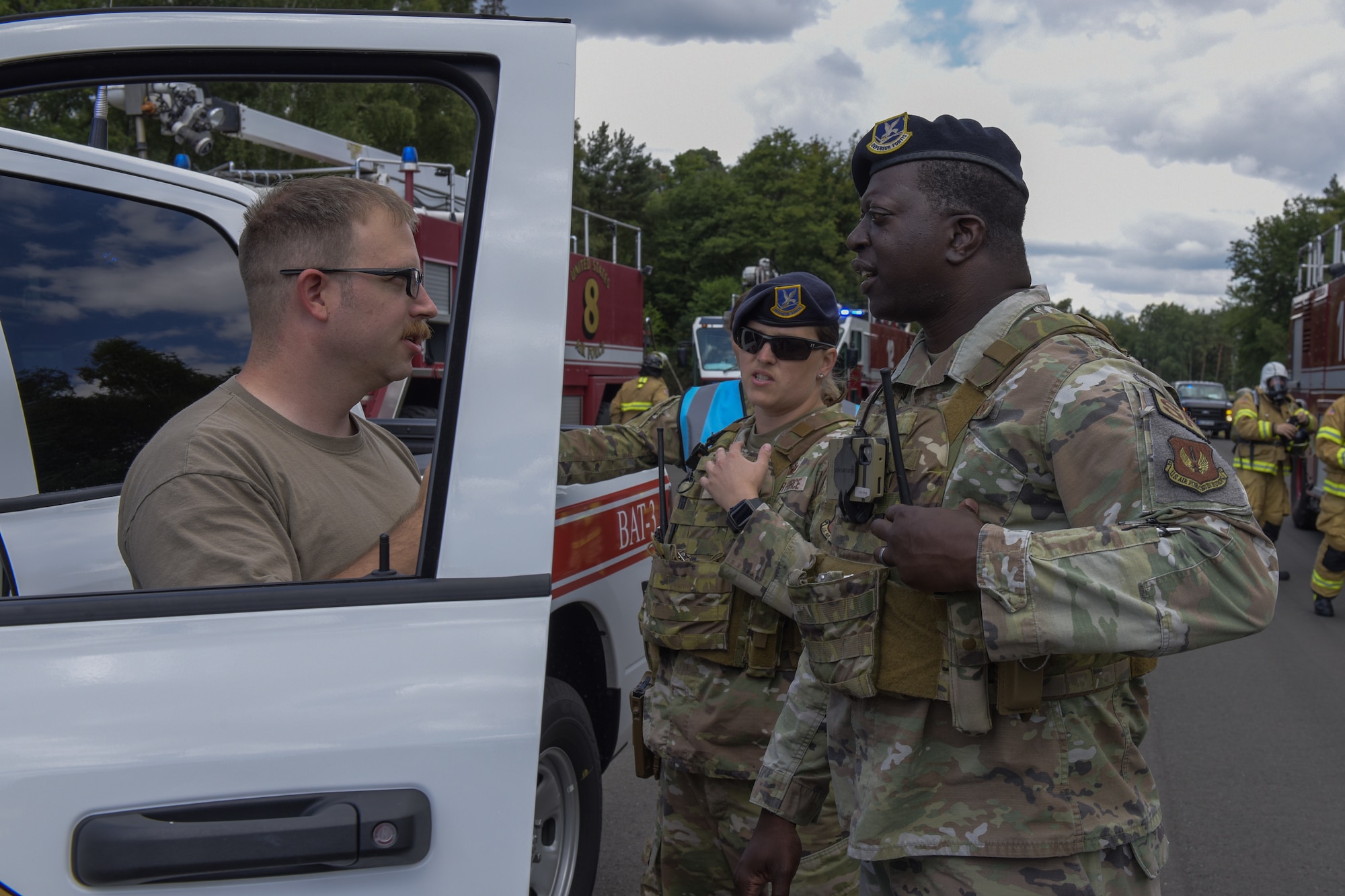 Emergency responders coordinate their response to simulated aircraft crash