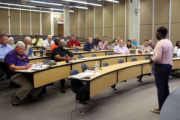 Dr. Wanda A. Swanier, director, SCMC, addresses the
leadership gathered for an off-site held 27 and 28 July at Albany State University, Albany, Ga. The off-site focused on center collaboration on the transformation initiatives established to keep pace and meet emerging needs of a more agile and expedionary Marine Corps and impacts of Force Design
2023.