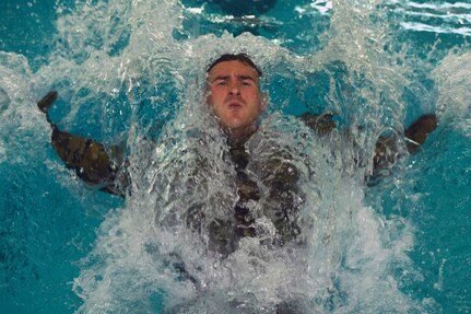 Spc. Wyatt Walls, a fire support specialist with the Oregon Army National Guard’s 2nd Battalion, 218th Field Artillery Regiment, performs a butterfly kick in a lap pool at the Middle Tennessee State University Aquatic Recreation Center in Murfreesboro, Tennessee, during the 2022 Army National Guard Best Warrior Competition July 25, 2022.