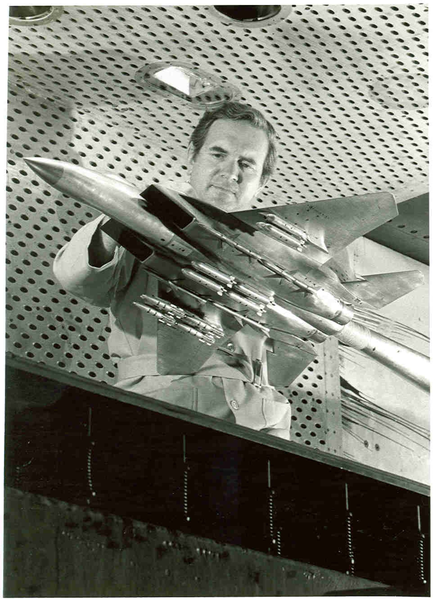 Test facility craftsman and electrician Don Pugh prepares a scale model of the F-15 Eagle in 1978 for aerodynamic load testing in the 4-foot transonic wind tunnel at Arnold Air Force Base, Tennessee, headquarters of Arnold Engineering Development Complex. The Air Force recently celebrated the 50th anniversary of the F-15’s deployment. Models of the aircraft, engines and other F-15 components have frequently been tested by AEDC over the past 50 years. (U.S. Air Force photo)