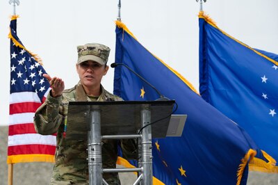 U.S. Army Col. Josie Carrasquillo at a podium talking to the audience