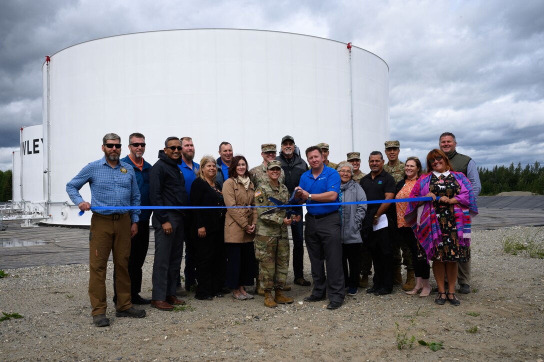 Attendees of the North Pole Defense Fuel Support Point ribbon-cutting ceremony pose for a group photo