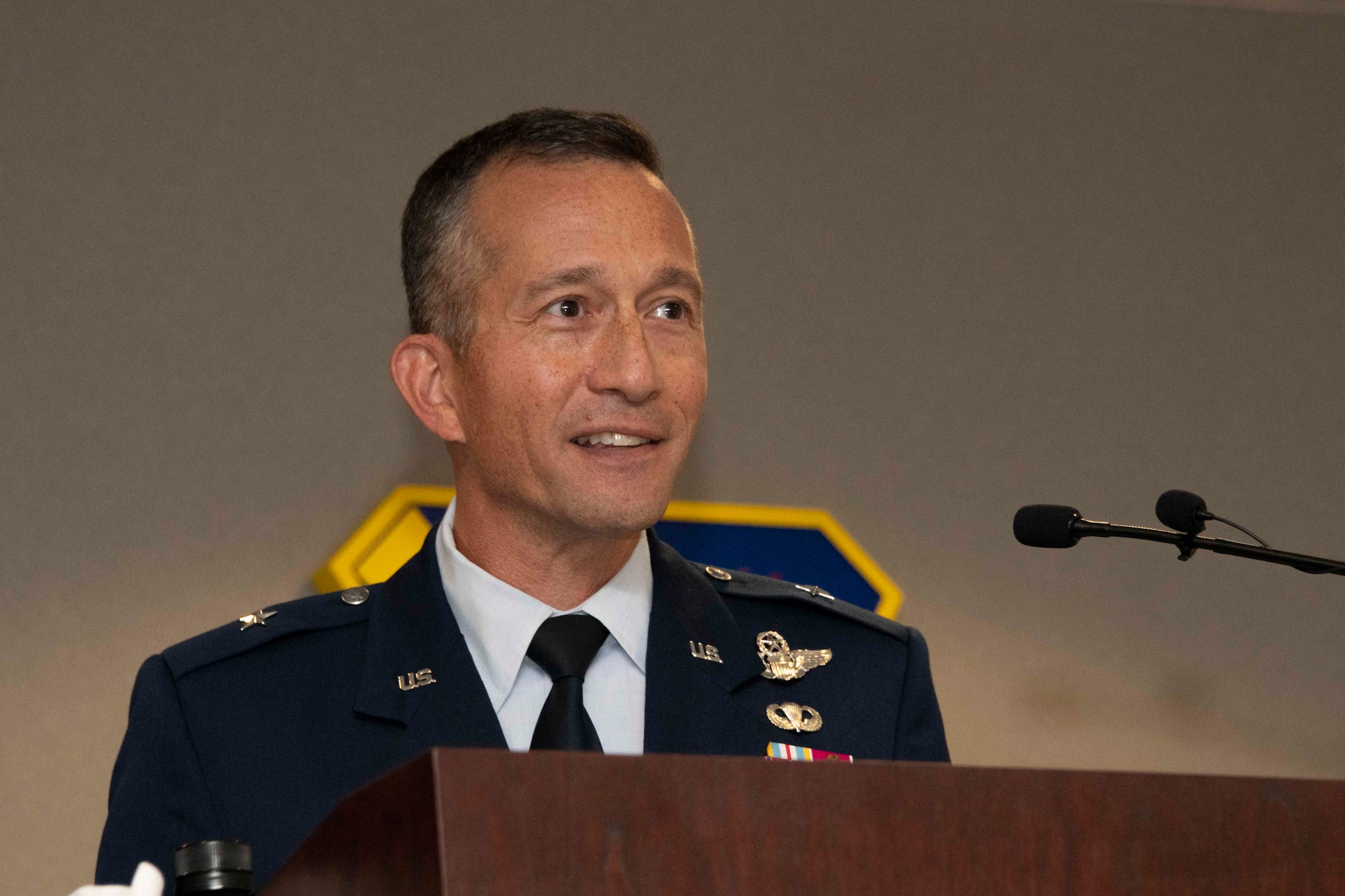 Brig. Gen. Houston Cantwell delivers a speech after assuming command of the Jeanne M. Holm Center for Officer Accessions and Citizen Development during a change of command ceremony, July 28, 2022, Maxwell Air Force Base, Alabama. Cantwell is now responsible for commissioning nearly 85% of the Department of the Air Force’s line officers through Officer Training School and the ROTC program and the citizen development of more than 100,000 high school students in Junior ROTC programs globally. (U.S. Air Force photo by Darius Hutton)