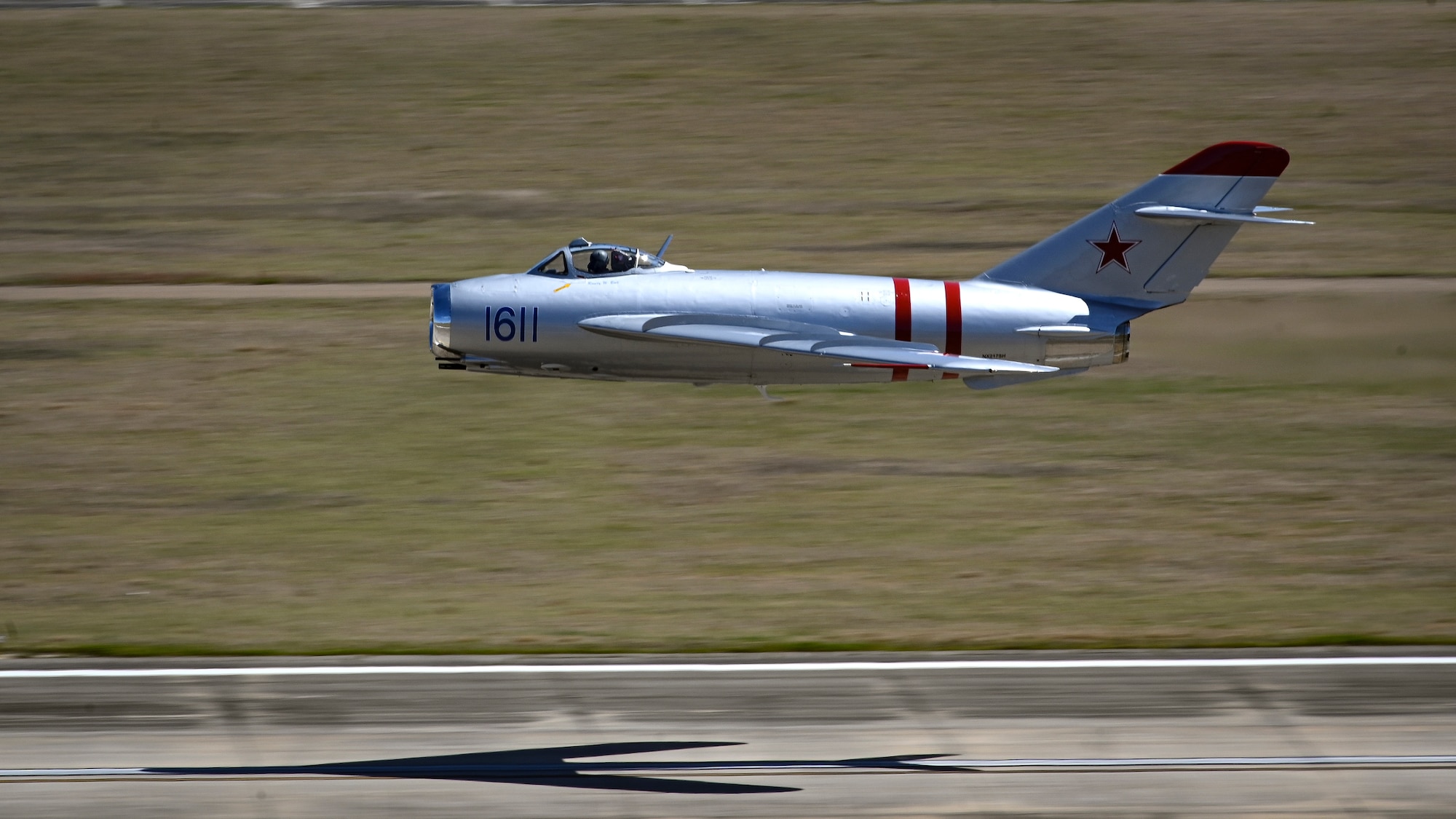 Randy Ball, an air demonstration pilot for the MIG-17, practices his act in preparation for the Shaw Air & Space Expo at Shaw Air Force Base, South Carolina, April 1, 2022. Participation in air shows allow the 20FW to showcase their capabilities to the public, while simultaneously building community relations. (U.S. Air Force photo by Senior Airman Madeline Herzog)