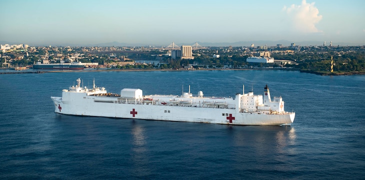 The hospital ship USNS Comfort (T-AH 20) is anchored off the coast of Santo Domingo, Dominican Republic as it prepares for a six-day medical mission, Oct. 14, 2019.