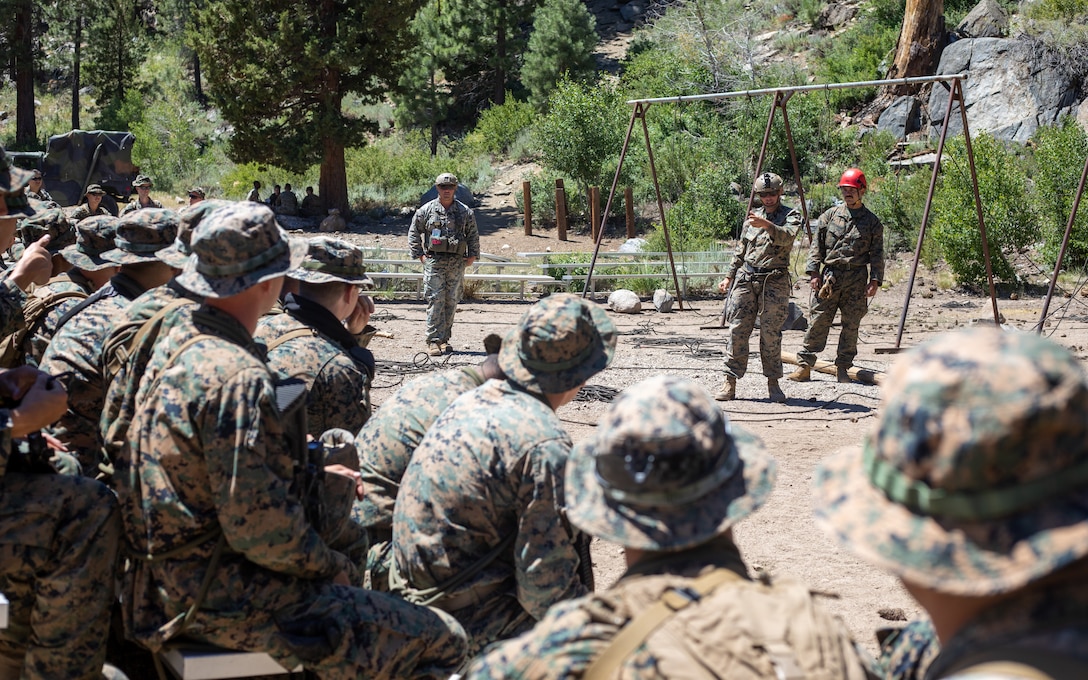 U.S. Marines with H&S Company, 1st Battalion, 24th Marine Regiment, 4th Marine Division, Marine Forces Reserve, are taught by instructors on rappelling down a cliff during a training class at Marine Corps Mountain Warfare Training Center, Bridgeport, Calif., July 22, 2022, for Mountain Training Exercise 4-22. MTX 4-22 prepares Marines for the challenges of operating in a harsh, mountainous environment many of their adversaries are acclimated to. (U.S. Marine Corps photo by Cpl. Jonathan L. Gonzalez)