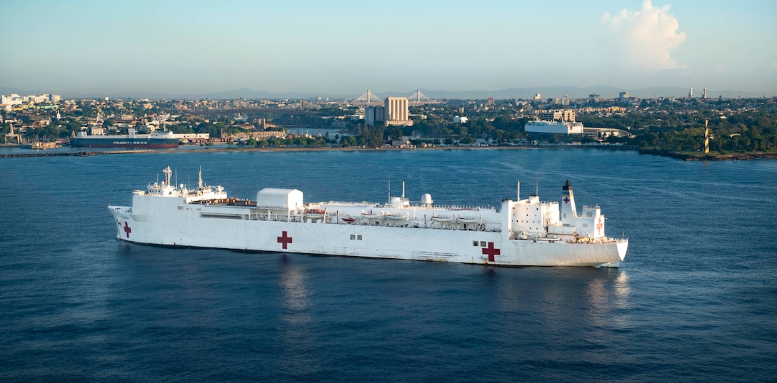 The hospital ship USNS Comfort (T-AH 20) is anchored off the coast of Santo Domingo, Dominican Republic as it prepares for a six-day medical mission, Oct. 14, 2019.