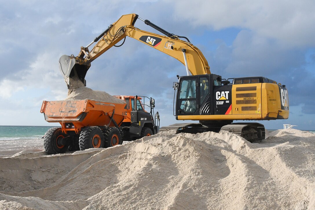 Yisseliz Rivera-Rodriquez, a civil engineer and Project Manager from the Jacksonville District, Miami Resident Office provides an overview of work on the Miami Beach Renourishment project that distributes sand placement at the southern end of the Indian Beach Park and Allison Beach.  (USACE photo by Mark Rankin)