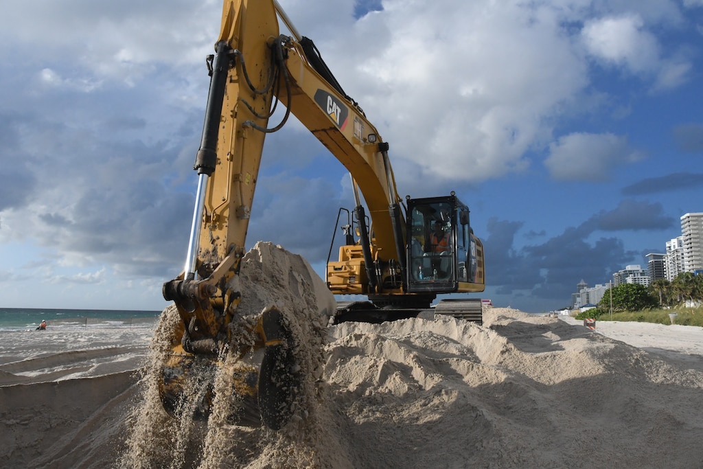 Yisseliz Rivera-Rodriquez, a civil engineer and Project Manager from the Jacksonville District, Miami Resident Office provides an overview of work on the Miami Beach Renourishment project that distributes sand placement at the southern end of the Indian Beach Park and Allison Beach.  (USACE photo by Mark Rankin)