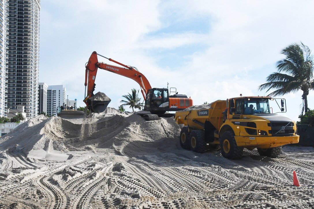 Yisseliz Rivera-Rodriquez, a civil engineer and Project Manager from the Jacksonville District, Miami Resident Office provides an overview of work on the Miami Beach Renourishment project that distributes sand placement at the southern end of the Indian Beach Park and Allison Beach.  (USACE photo by Mark Rankin)