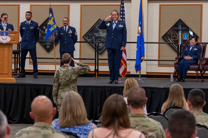 Maj. Laura Johnson, 341st Operational Readiness Squadron mental health flight commander, renders a first salute to Lt. Col. Jennifer Harward, 341st OMRS commander, during a change of command ceremony July 28, 2022, at Malmstrom Air Force Base, Mont. The first and last salute is an Air Force tradition to allow personnel within squadrons to show respect to incoming and outgoing commanders during change of command ceremonies. (U.S. Air Force photo by Airman 1st Class Elijah Van Zandt)