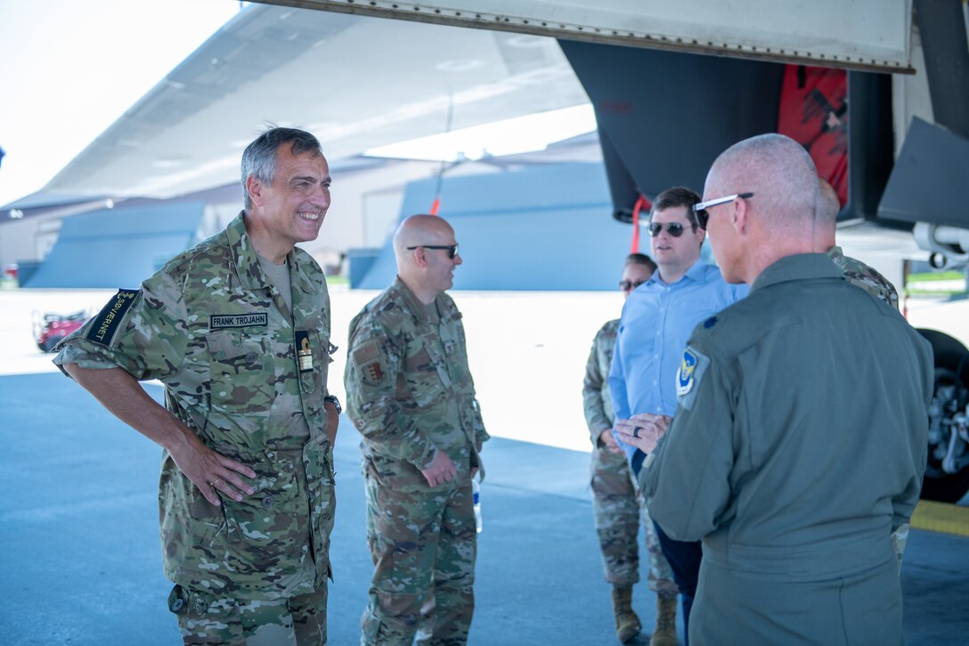 Royal Danish Navy Admiral Frank Trojahn, visiting Denmark defense attache speaks with Ellsworth personnel about the B-1B Lancer at Ellsworth Air Force Base, S.D., July 20, 2022.