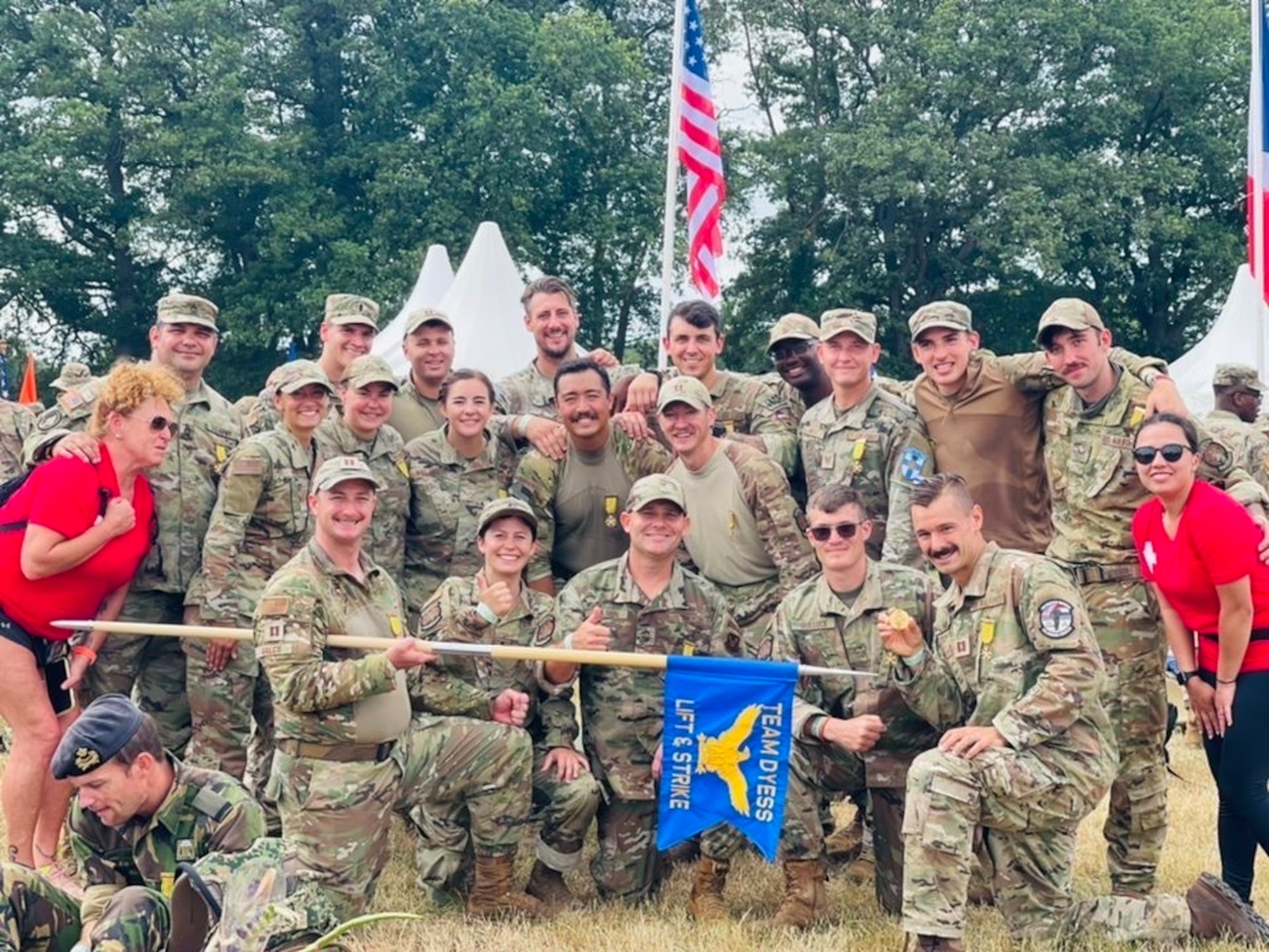 Dyess Air Force Base Rapid Airman Development Team stands with the 7th Bomb Wing Gideon July 21, 2022, after earning the 4-Daagse March Team Medal in Nijmegen, the Netherlands. (U.S.Air Force Photo By 1st Lt Kaitlin Cashin)