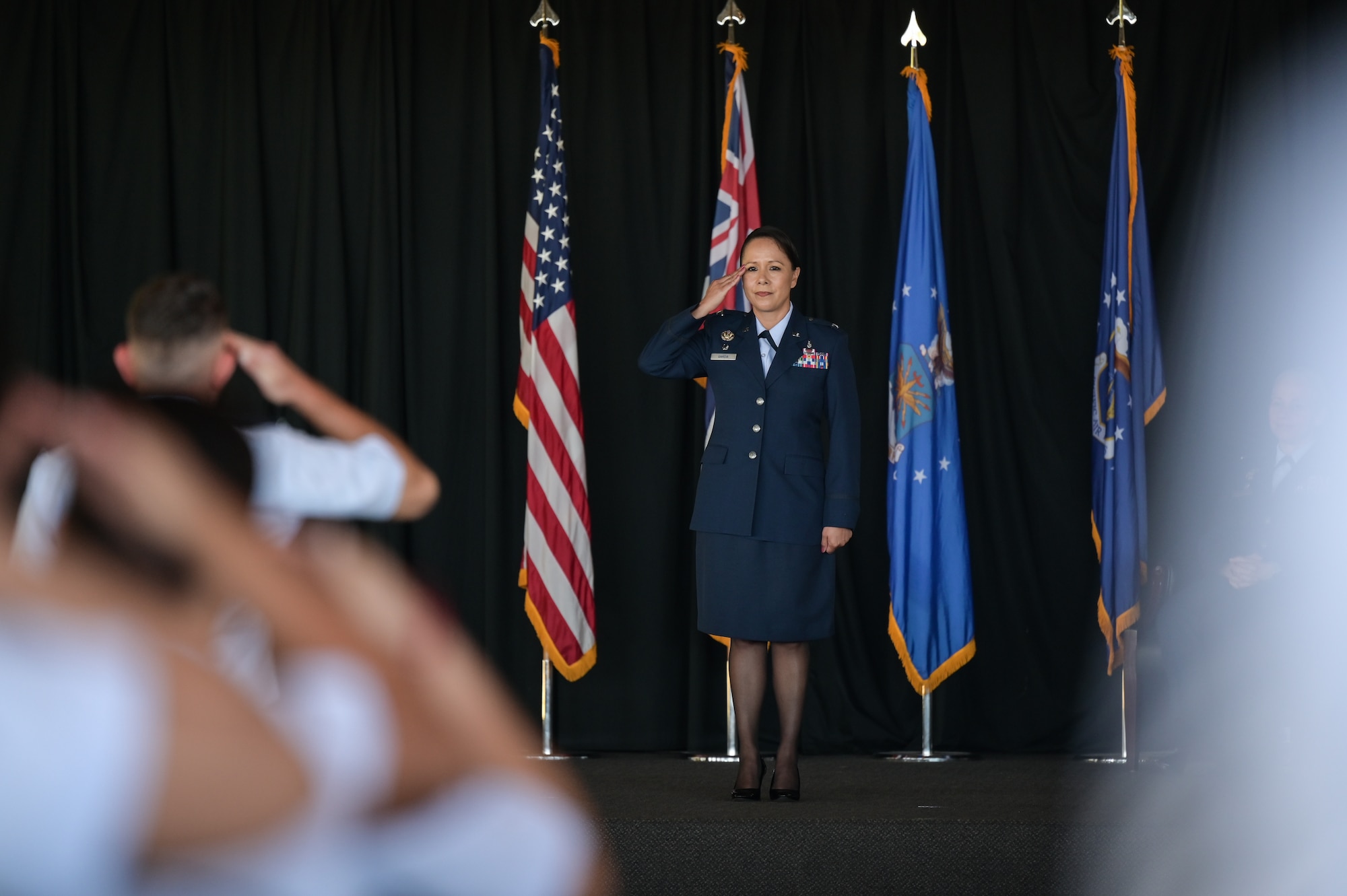 Col. Stella Garcia, 15th Medical Group commander, receives her first salute during a change of command ceremony at Joint Base Pearl Harbor-Hickam, Hawaii, Aug. 1, 2022. Airmen assigned to the 15th Healthcare Operations Squadron, the 15th Medical Support Squadron and the 15th Operational Medical Readiness Squadron rendered Garcia’s first salute. (U.S. Air Force photo by Staff Sgt. Alan Ricker)