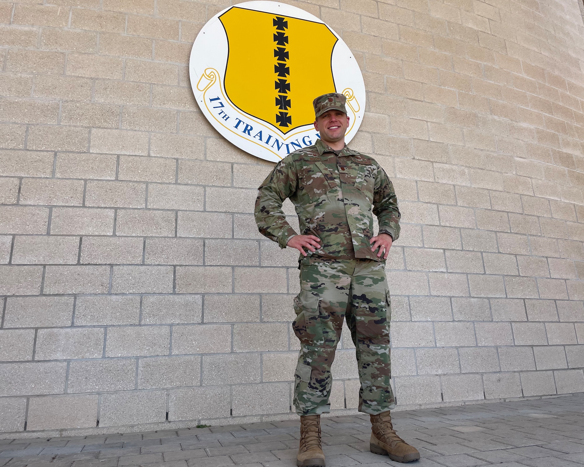 U.S. Air Force Maj. Justin Moore, 17th Comptroller Squadron and 17th Wing Staff Agencies commander, stands for a photo outside of the Norma Brown building, Goodfellow Air Force Base, Texas, June 24, 2022. One of Moore’s command priorities is fostering an environment of development and respect. (U.S. Air Force photo by Senior Airman Abbey Rieves)