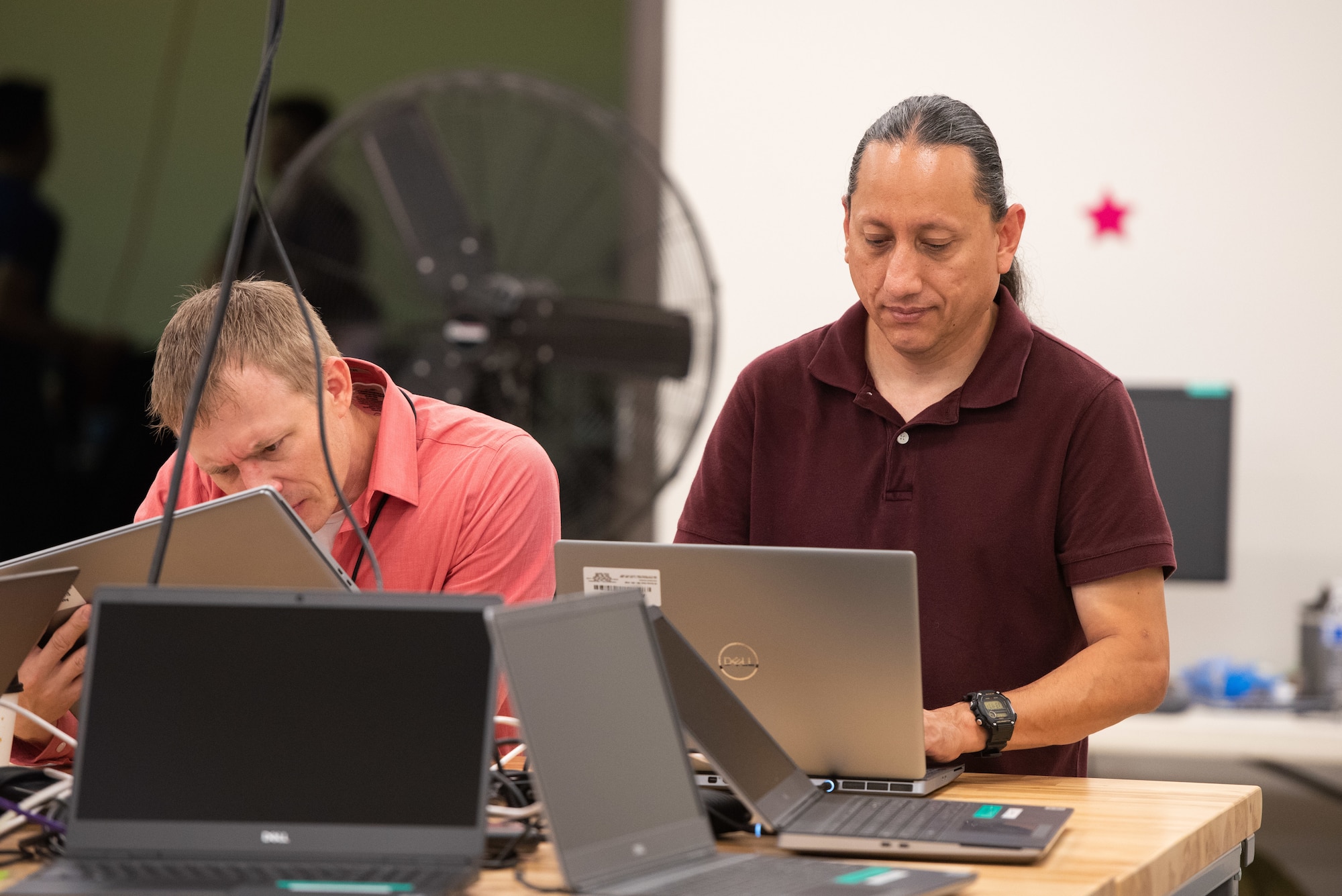 Participants of the BRAVO Hackathon conduct research July 18, 2022, at Patrick Space Force Base, Fla. The event brought engineers, scientists, and coders together from four countries to solve problems with the launch mission. (U.S. Space Force photo by Amanda Inman)