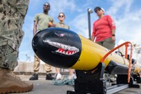HONOLULU (July 14, 2022) - Aerographer’s Mates from U.S. Navy Fleet Survey Team utilize a IVER3-580 Autonomous Underwater Vehicle to scan the ocean floor for hazards. This is part of a Humanitarian Assistance Disaster Response (HADR) scenario to safely reopen a port following a typhoon. Unmanned and remotely operated vessels extend the capability of interconnected manned platform sensors to enhance the warfighting capacity of multinational joint task forces. Twenty-six nations, 38 ships, four submarines, more than 170 aircraft and 25,000 personnel are participating in RIMPAC from June 29 to Aug. 4 in and around the Hawaiian Islands and Southern California. The world's largest international maritime exercise, RIMPAC provides a unique training opportunity while fostering and sustaining cooperative relationships among participants critical to ensuring the safety of sea lanes and security on the world's oceans. RIMPAC 2022 is the 28th exercise in the series that began in 1971. (Royal New Zealand Air Force photo by Cpl. Dillon Anderson)