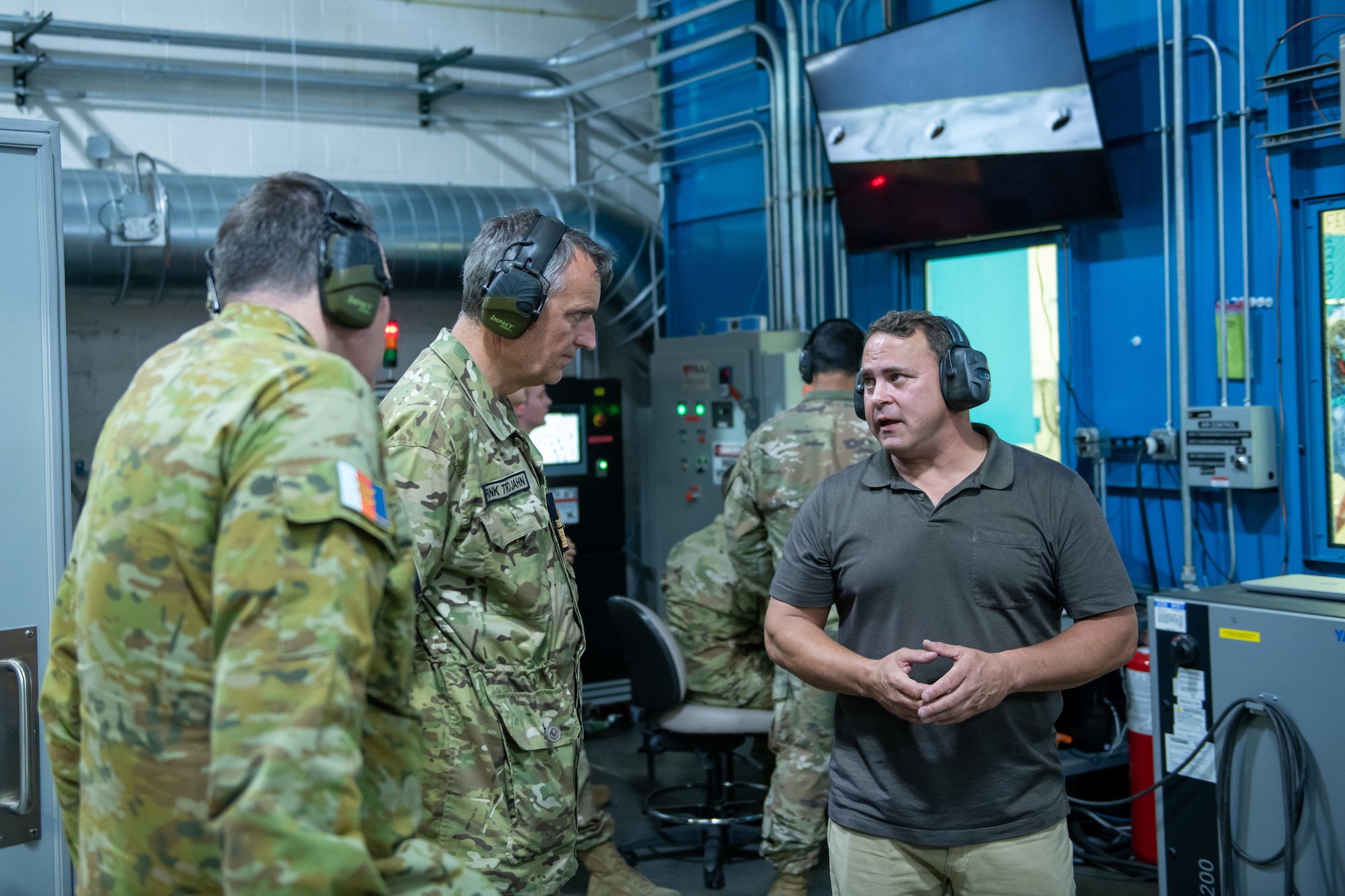 Foreign defense attaches visit the additive manufacturing facility on Ellsworth Air Force Base, S.D., July 20,2022.