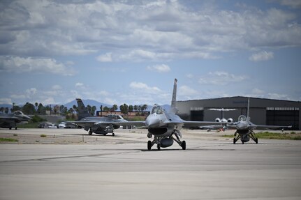 The last four F-16s belonging to the Royal Netherlands Air Force taxi after landing July 29, 2022, at the Morris Air National Guard Base in Tucson, Ariz. The Dutch were the first in a long line of foreign partners to train at Morris ANG Base, flying an average of 2,000 hours per year in the F-16 and graduating four student pilots every nine months as part of the 148th Fighter Squadron.