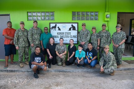 KOROR, Palau (July 21, 2022) – Rear Adm. Bruce Gillingham, the 39th Surgeon General of the United States Navy, back, 3rd from left, poses for a photo with Pacific Partnership personnel and Koror State Animal Shelter personnel after a tour in support of Pacific Partnership 2022. Now in its 17th year, Pacific Partnership is the largest annual multinational humanitarian assistance and disaster relief preparedness mission conducted in the Indo-Pacific. (U.S. Navy photo by Mass Communication Specialist 2nd Class Drace Wilson)