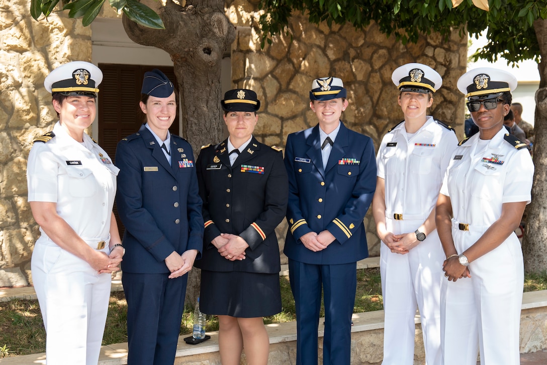 FAYADIYEH, Lebanon (Aug. 1, 2022) From the left, Navy Lt. Cmdr. Kendra Carter, Air Force 1st Lt. Alydia Ball, Army National Guard 1st Lt. Ashley Estep, Coast Guard Lt. j.g. Kayla Sowers, Navy Ensign Allison Sterr, and Navy Ensign Rochelle Brown, pose for a photo during a reception following a graduation ceremony for the Lebanese Army Military Academy in Fayadiyeh, Lebanon, Aug. 1. The officers attended the ceremony to support the first group of Lebanese women who graduated from the academy and into the combat arms field. (U.S. Navy photo by Mass Communication Specialist 1st Class Anita Chebahtah)
