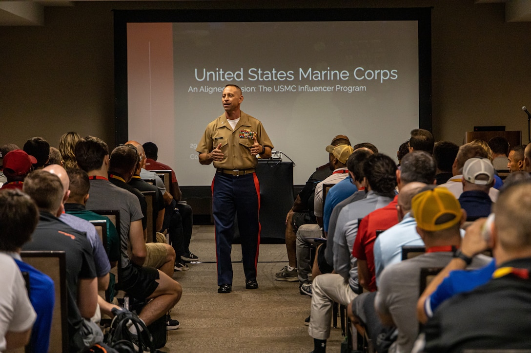 U.S. Marine Corps Colonel Timothy Dremann, Chief of Staff, Marine Corps Recruit Depot Parris Island, S.C., gives a keynote address to coaches attending the National Wrestling Coaches Association (NWCA) annual convention in Jacksonville, FL., July 29.  Through a national partnership with NWCA, the Marine Corps Recruiting Command seeks to establish advocacy with role models and leaders who positively impact and influence high school and college student-athletes.  Marines from Recruiting Station Jacksonville attended the event to share expertise on leadership, physical fitness, and to showcase opportunities in today's Marine Corps. (U.S. Marine Corps photo by Lance Cpl. Gustavo Romero)