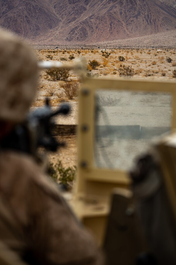U.S. Marine Corps Lance Cpl. Eliezel Heredia, a motor vehicle operator with Truck Company, 25th Marine Regiment, fires at a target on Range 113 during Integrated Training Exercise 4-22 at Marine Corps Air-Ground Combat Center, Twentynine Palms, Calif., July 27, 2022. MAGTF-23 aggregated at Marine Corps Air-Ground Combat Center from 55 Home Training Centers, further preparing Marine Forces Reserve for potential future mobilizations and deployments. (U.S. Marine Corps photo by. Cpl. Ryan Schmid)
