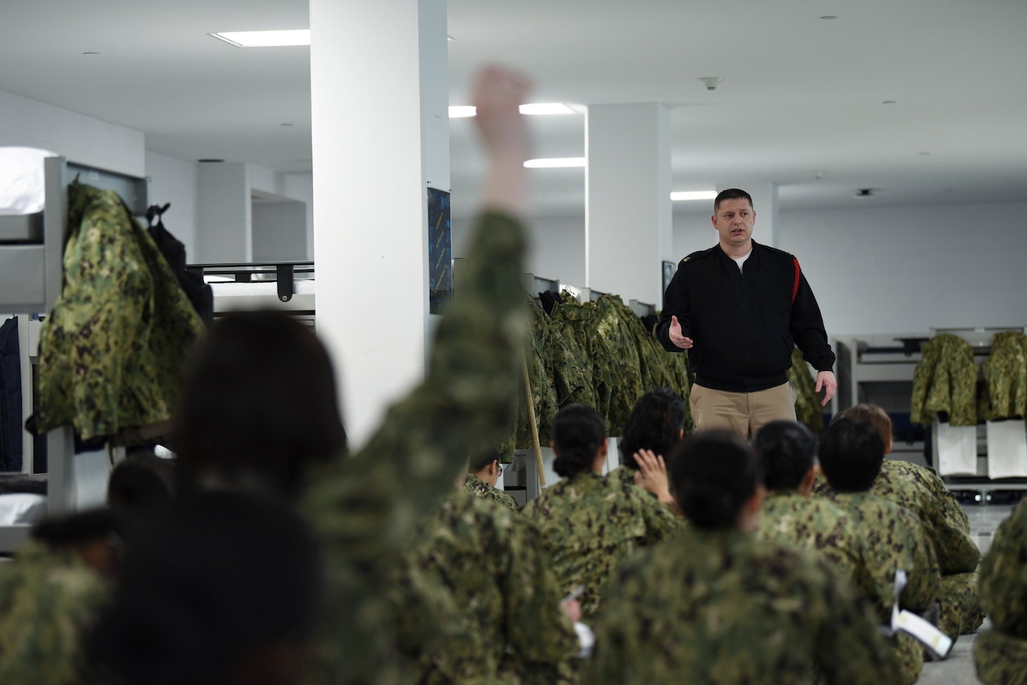 190207-N-BM202-2085 GREAT LAKES, Ill. (Feb. 7, 2019) Recruits ask their recruit division commander questions during general military training at Recruit Training Command. More than 30,000 recruits graduate annually from the Navy's only boot camp. (U.S. Navy photo by Mass Communication Specialist 2nd Class Camilo Fernan)