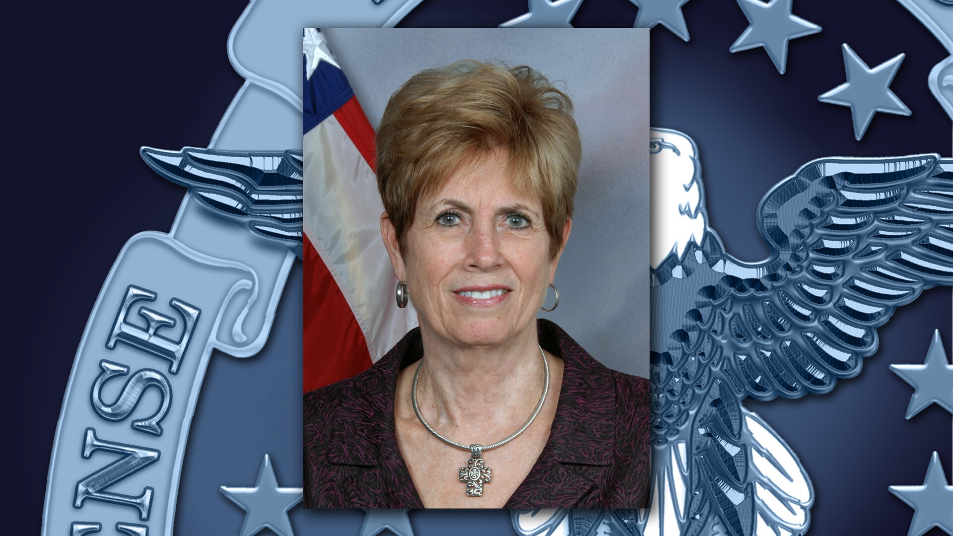A portrait of Janet Hoffheins over a DLA emblem background