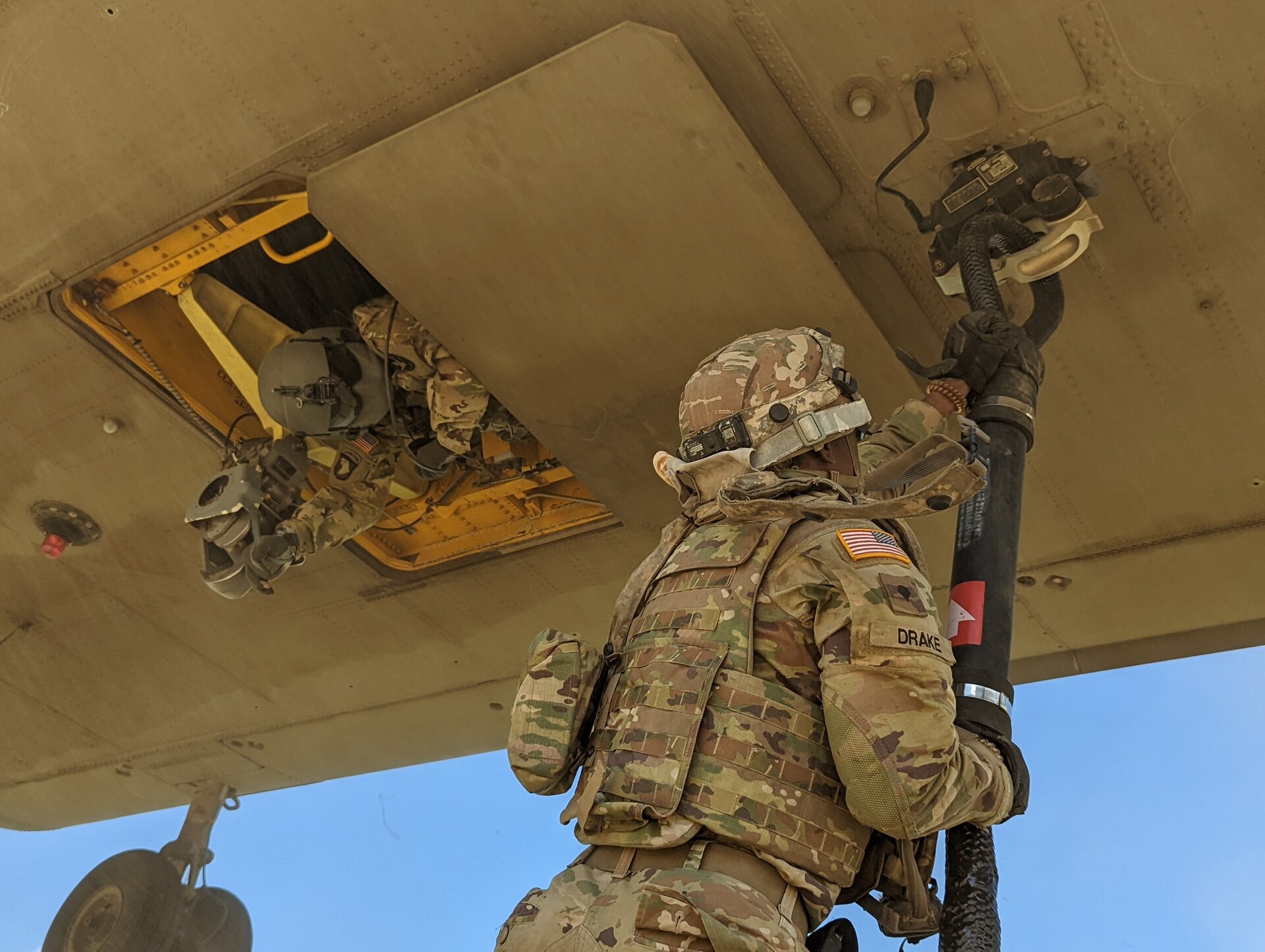 Spc. Javon Drake, an field artillery specialist assigned to C Battery, 1st Battalion,118th Field Artillery Regiment, 48th Infantry Brigade Combat Team, links the M777 Howitzer to a CH-47 Chinook aircraft June 22, 2022 on Fort Stewart, Ga.